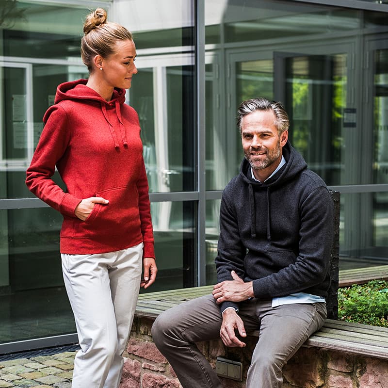 Male & female dressed in coloured hoodies