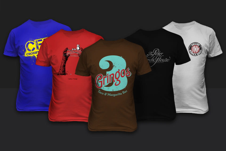 A group of custom designed printed t-shirts